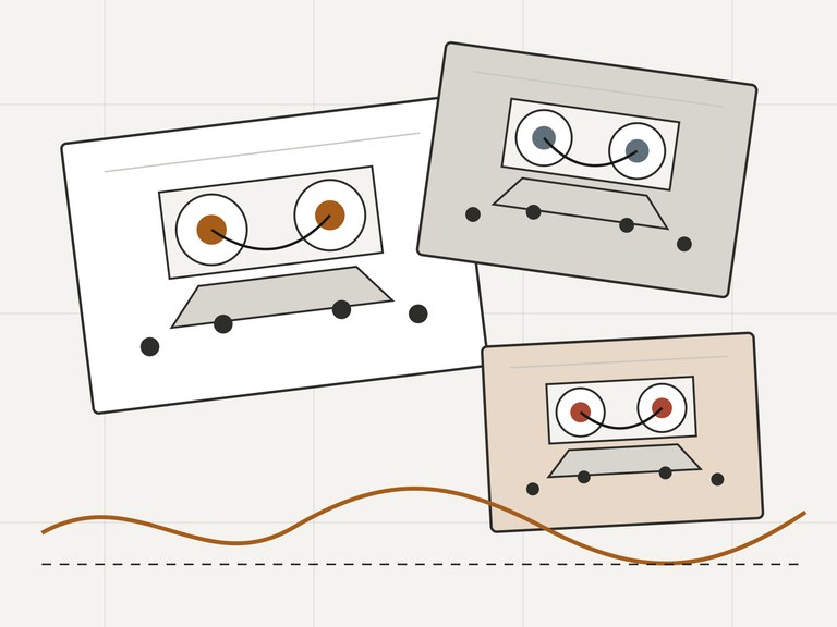 Illustrazione tecnica di audiocassette con griglia di misura.